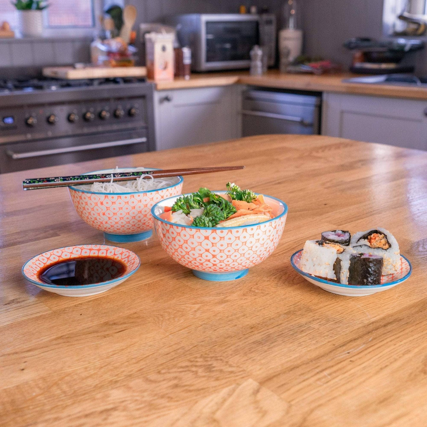 Orange and blue trim dipping saucer