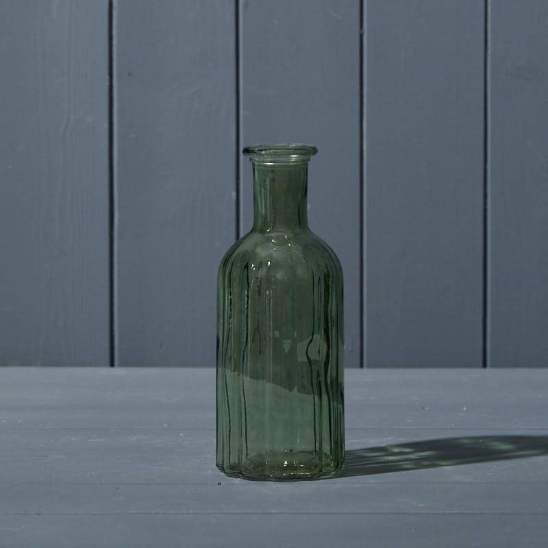 Vintage green ribbed bottle