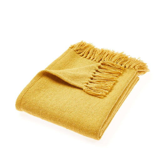 Plain woven throw in golden yellow