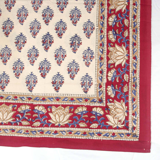 Red and cream tablecloth with blue motif