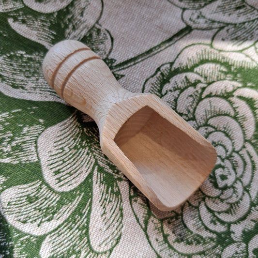 Small wooden scoop