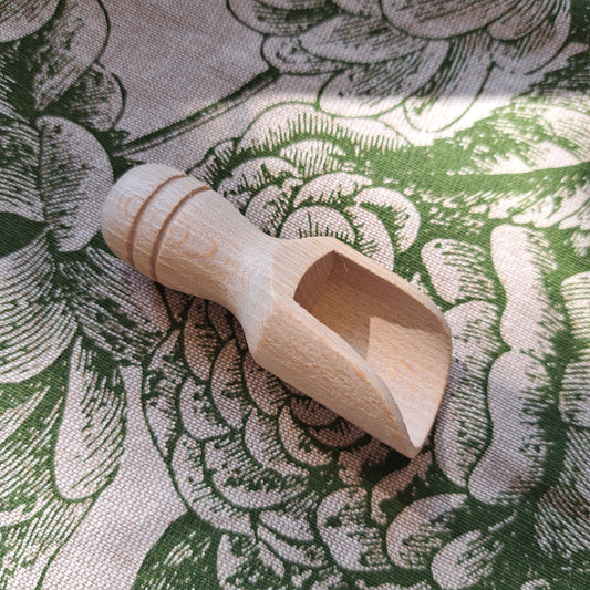 Small wooden scoop