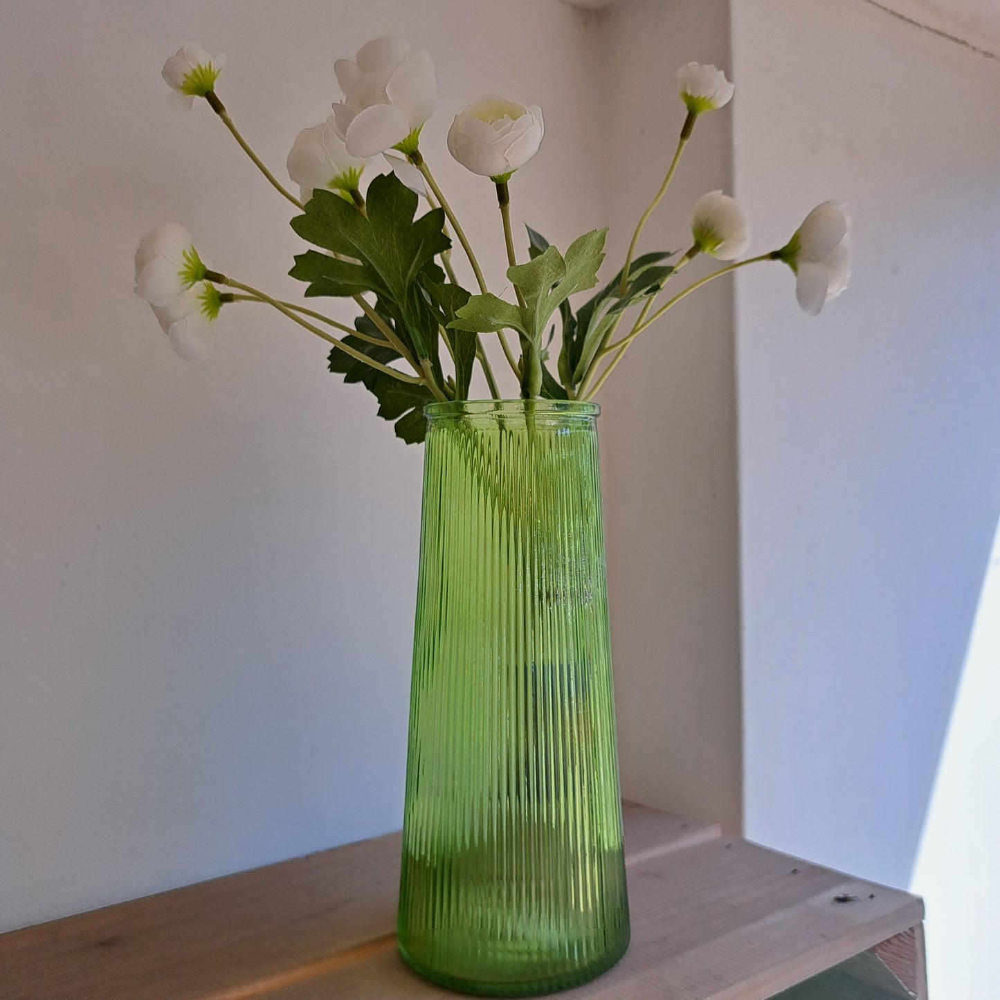Green ribbed vase