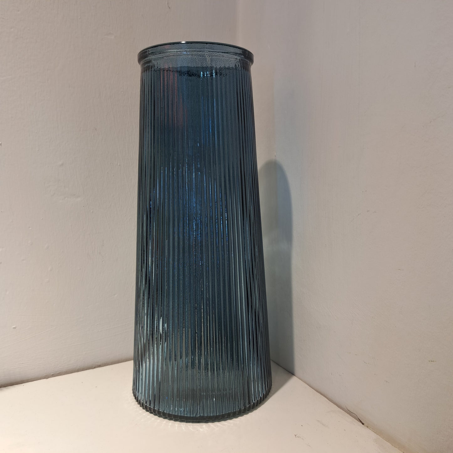 Blue ribbed vase