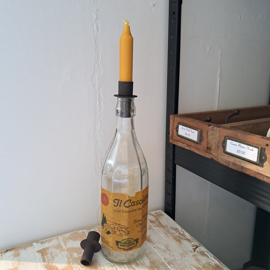 Candle holder for bottles
