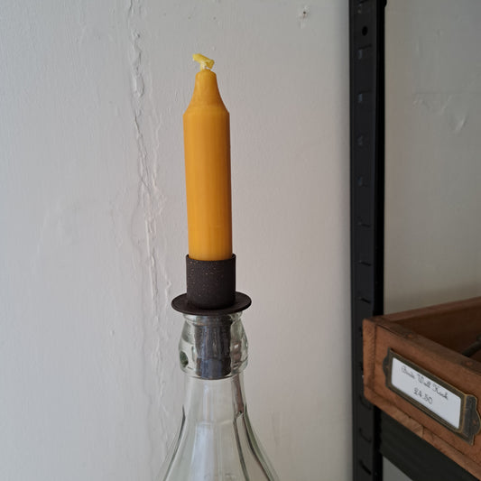 Candle holder for bottles