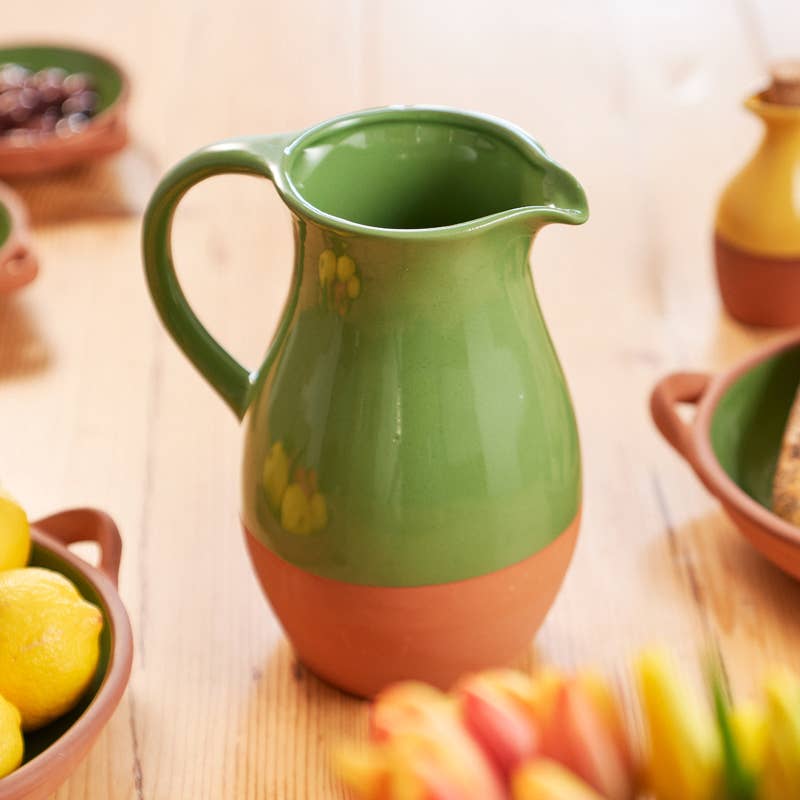 Glazed terracotta jug in green