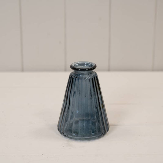 Blue coloured ribbed glass cone bottle