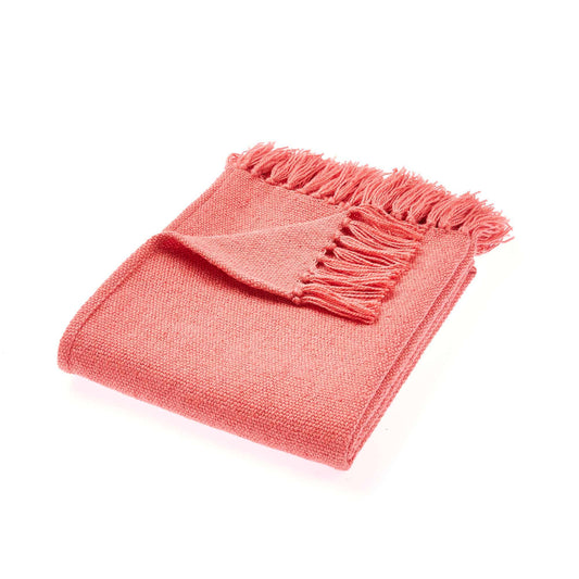 Plain woven throw in coral pink