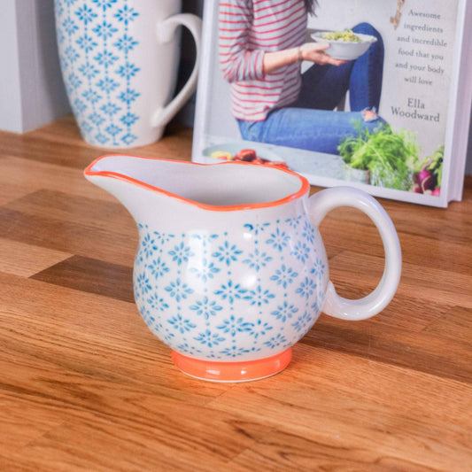 Small jug in blue and orange