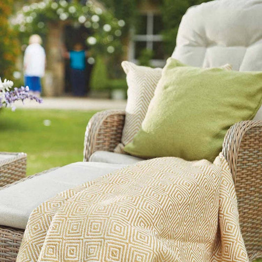 Woven diamond throw in golden yellow