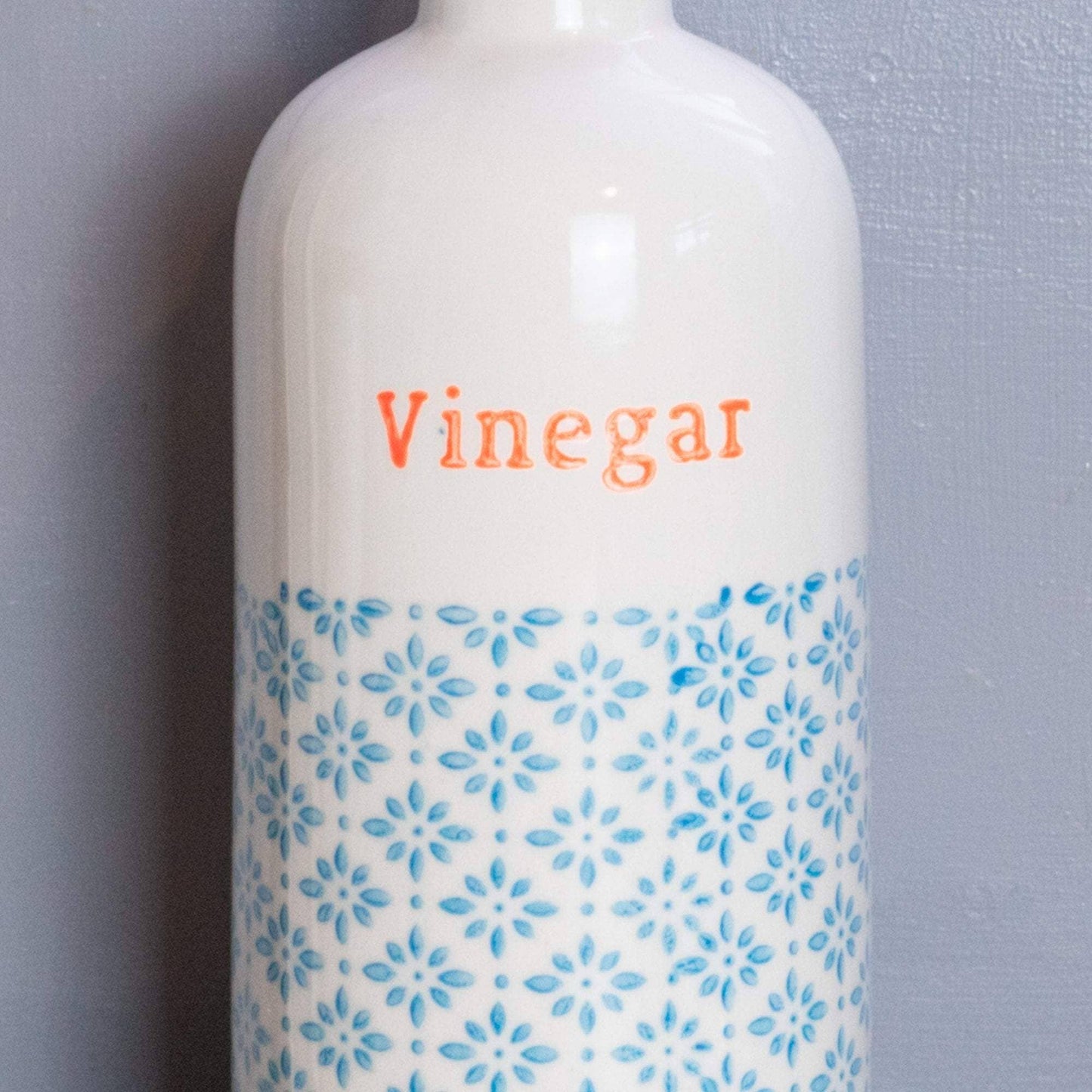 Vinegar bottle in blue and orange