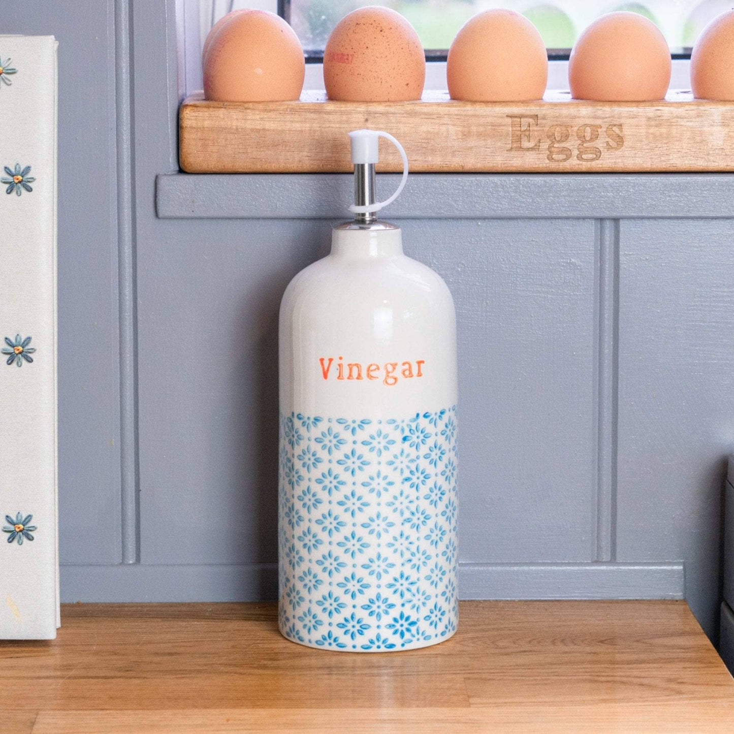 Vinegar bottle in blue and orange