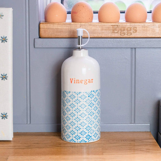 Vinegar bottle in blue and orange