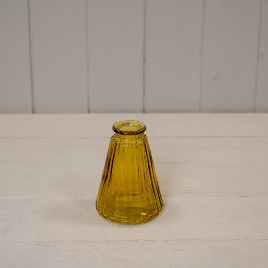 Yellow coloured ribbed glass cone bottle