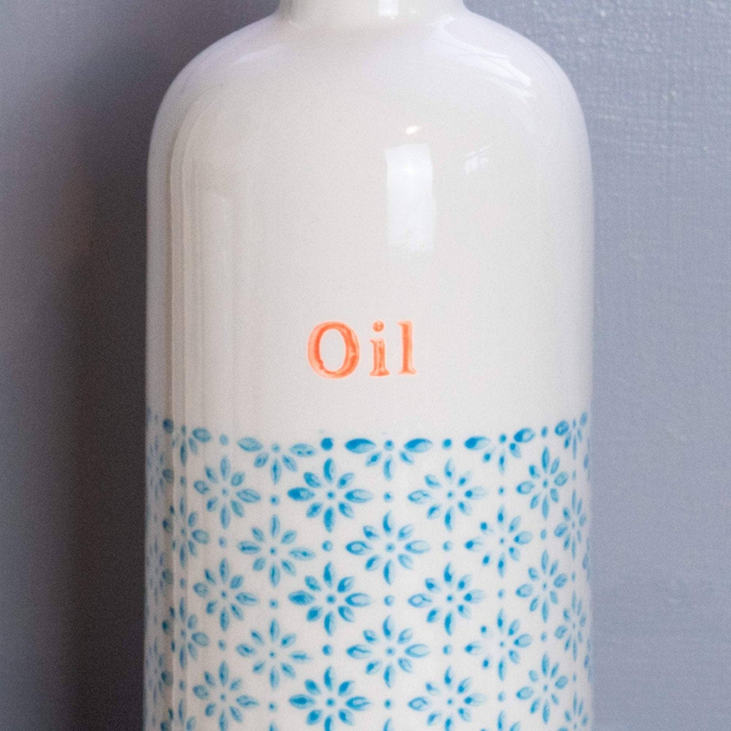 Oil bottle in blue and orange