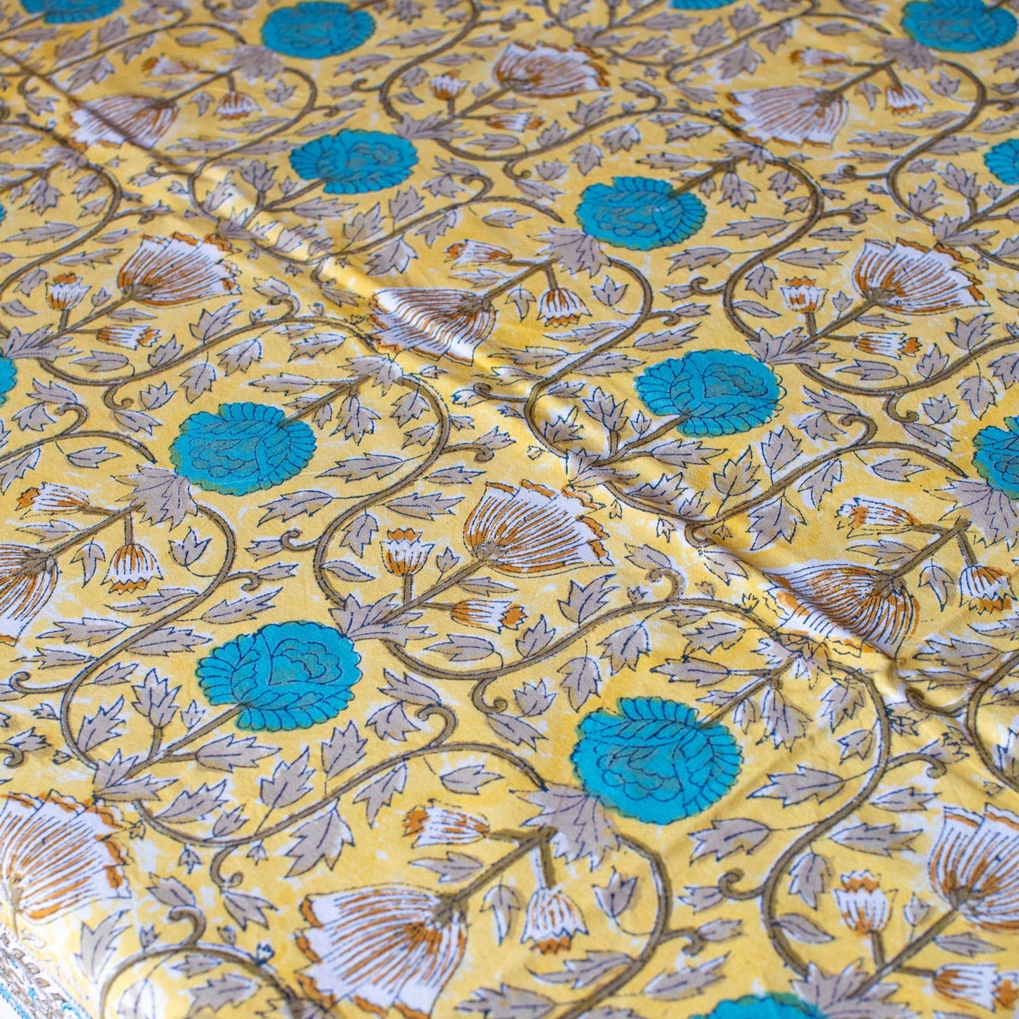 Turquoise and yellow tablecloth