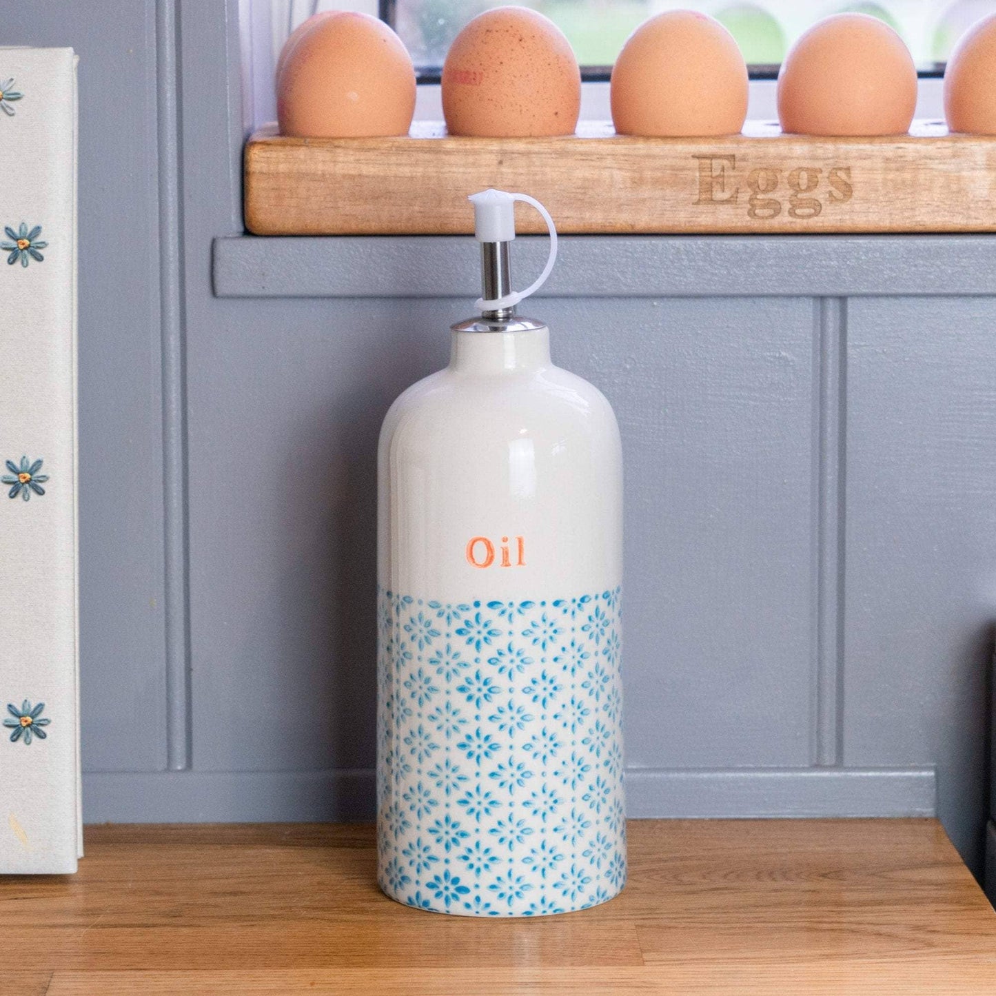 Oil bottle in blue and orange