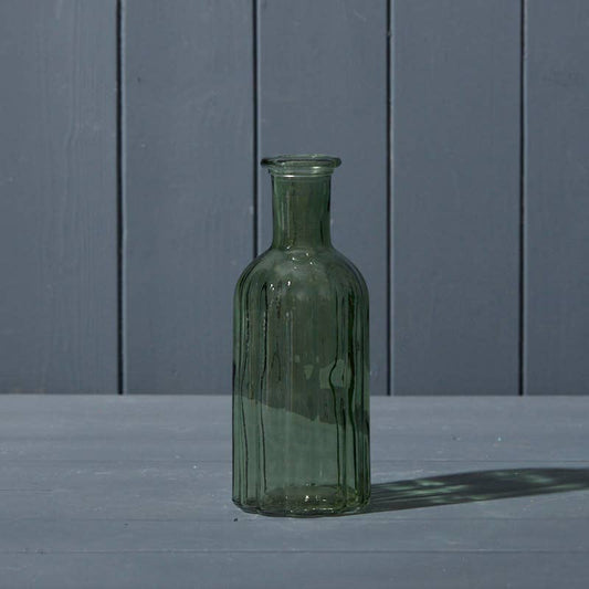 Vintage green ribbed bottle