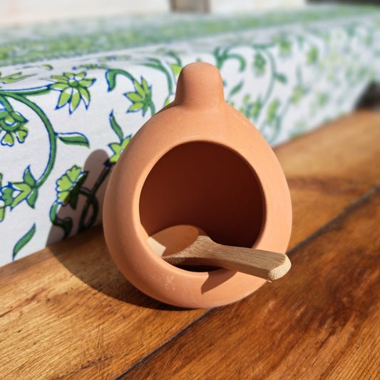Terracotta salt cellar with spoon
