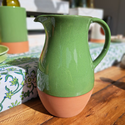Glazed terracotta jug in green