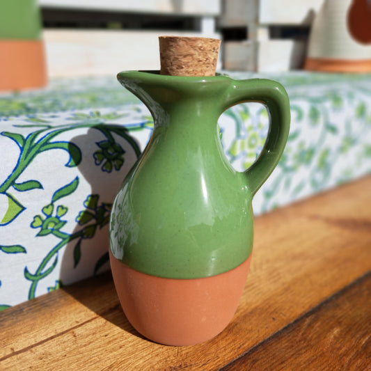 Glazed terracotta oil drizzler in green
